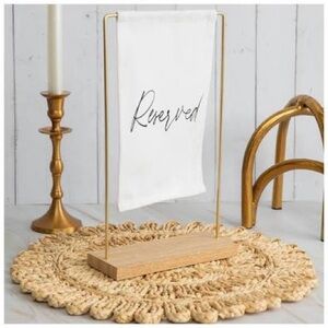Gold and White Reserved Sign